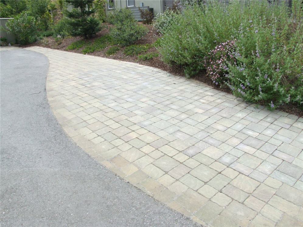 Brick Walkway Next to Driveway